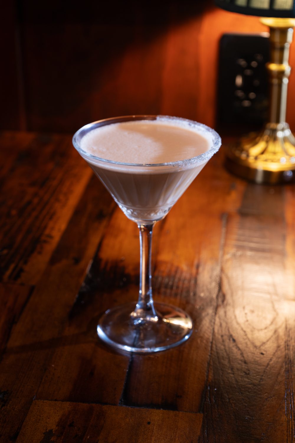 A craft cocktail at The Library speakeasy