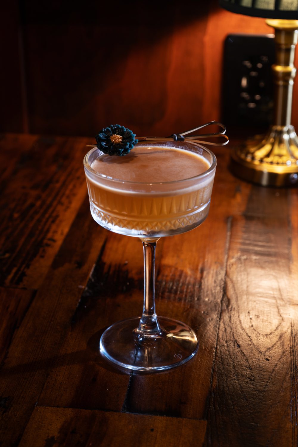 A craft cocktail at The Library speakeasy